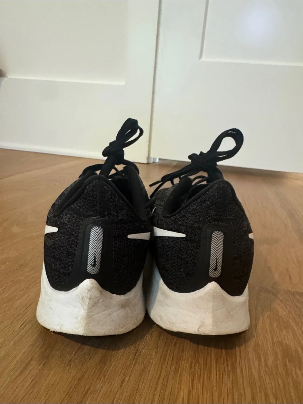 Nike Black and White Zoom Running Sneakers